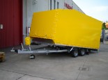 trailer with a cover sheet for car transport